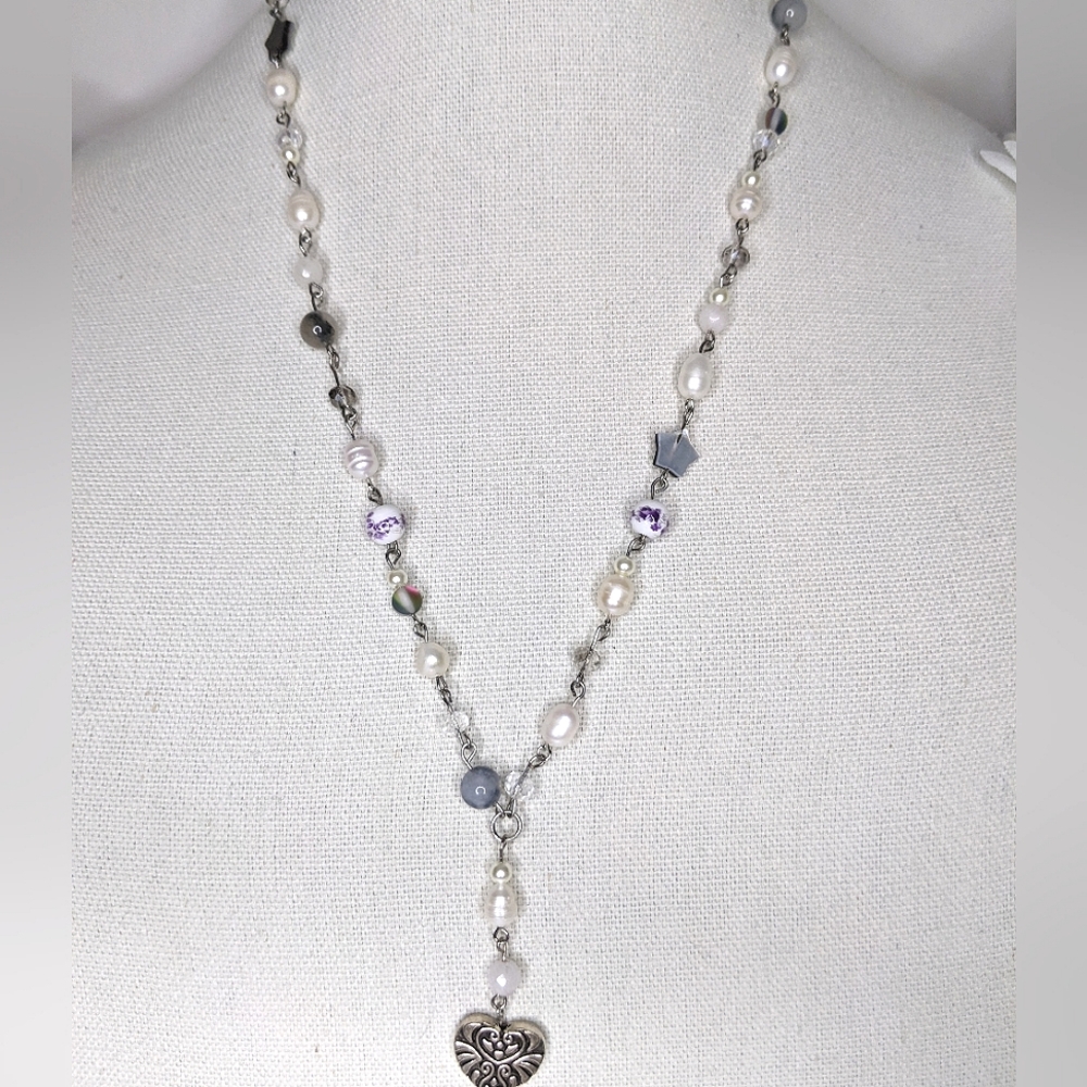 Long freshwater Pearl necklace with crystal beads and a charm. Handmade by me.